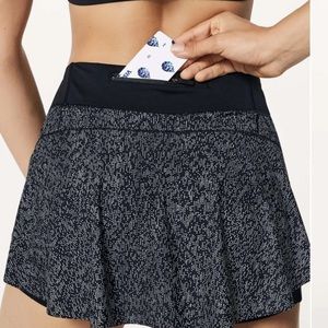 Lululemon, black sound wave quick pace tennis skirt size 10 NWOT